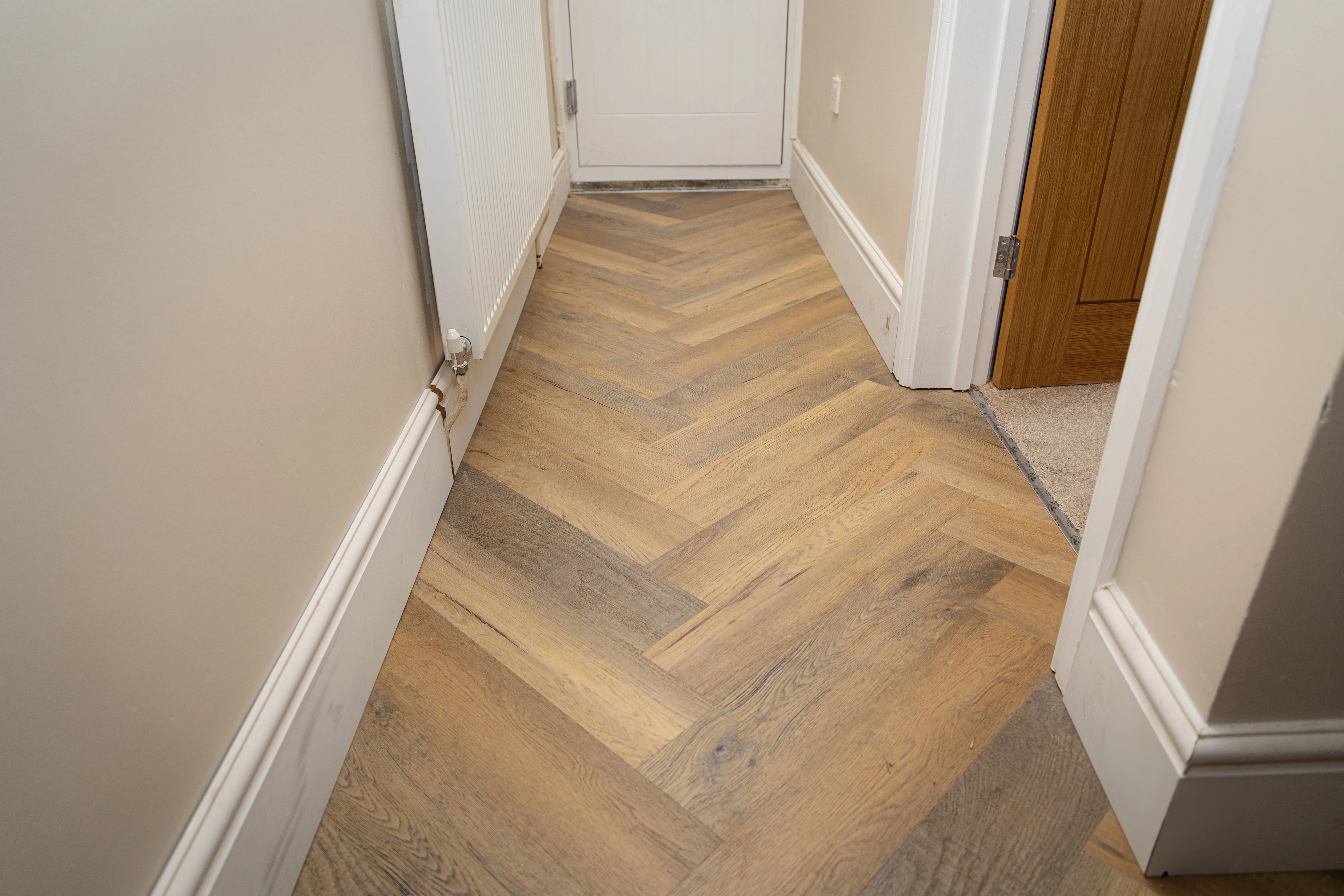 Heritage Milford Oak 6.5mm Click Herringbone LVT SPC Waterproof Flooring - Image 11