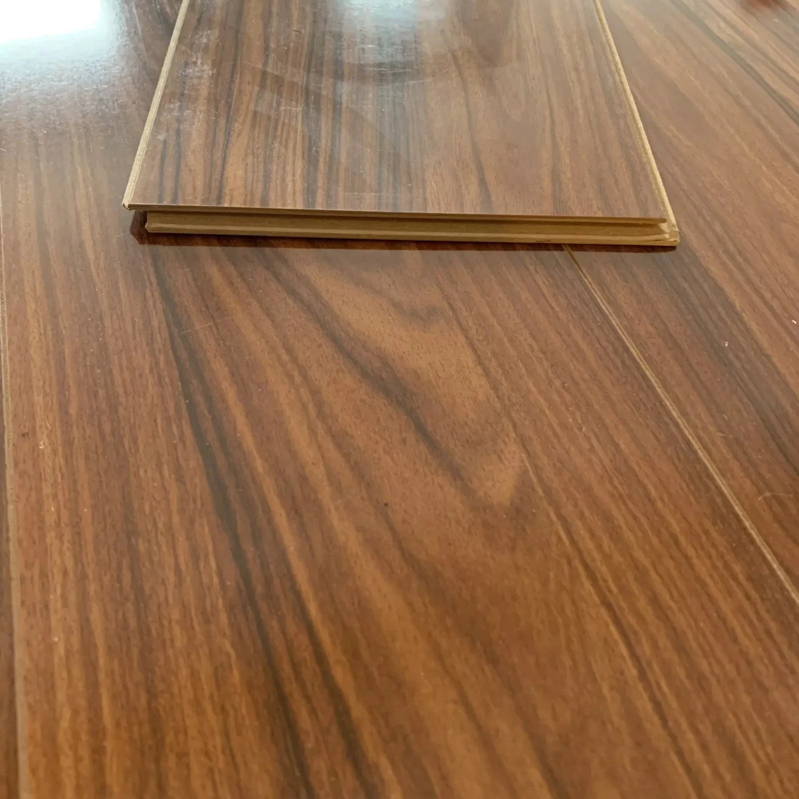 High Gloss Bourbon Laminate Flooring - Image 10