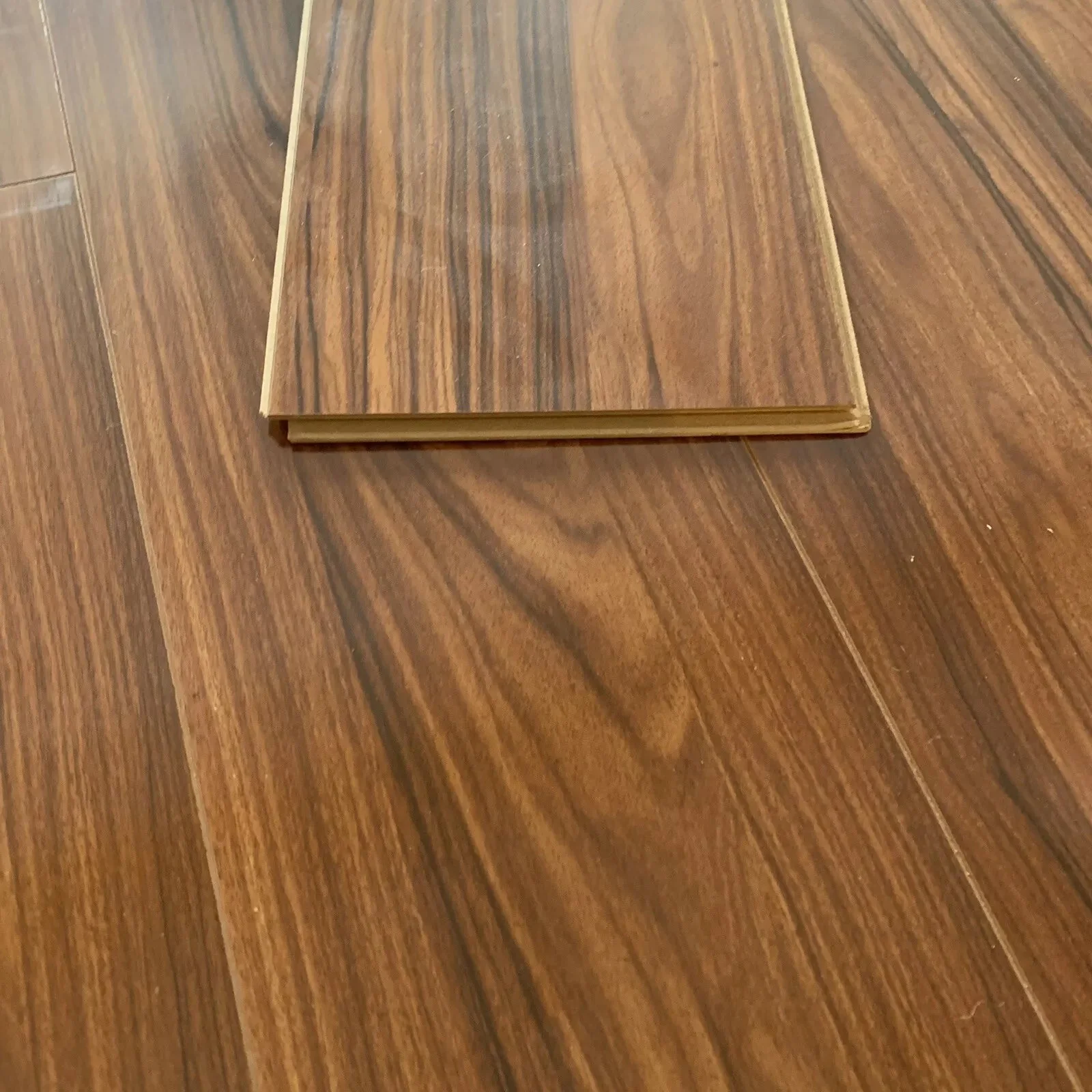 High Gloss Bourbon Laminate Flooring - Image 11
