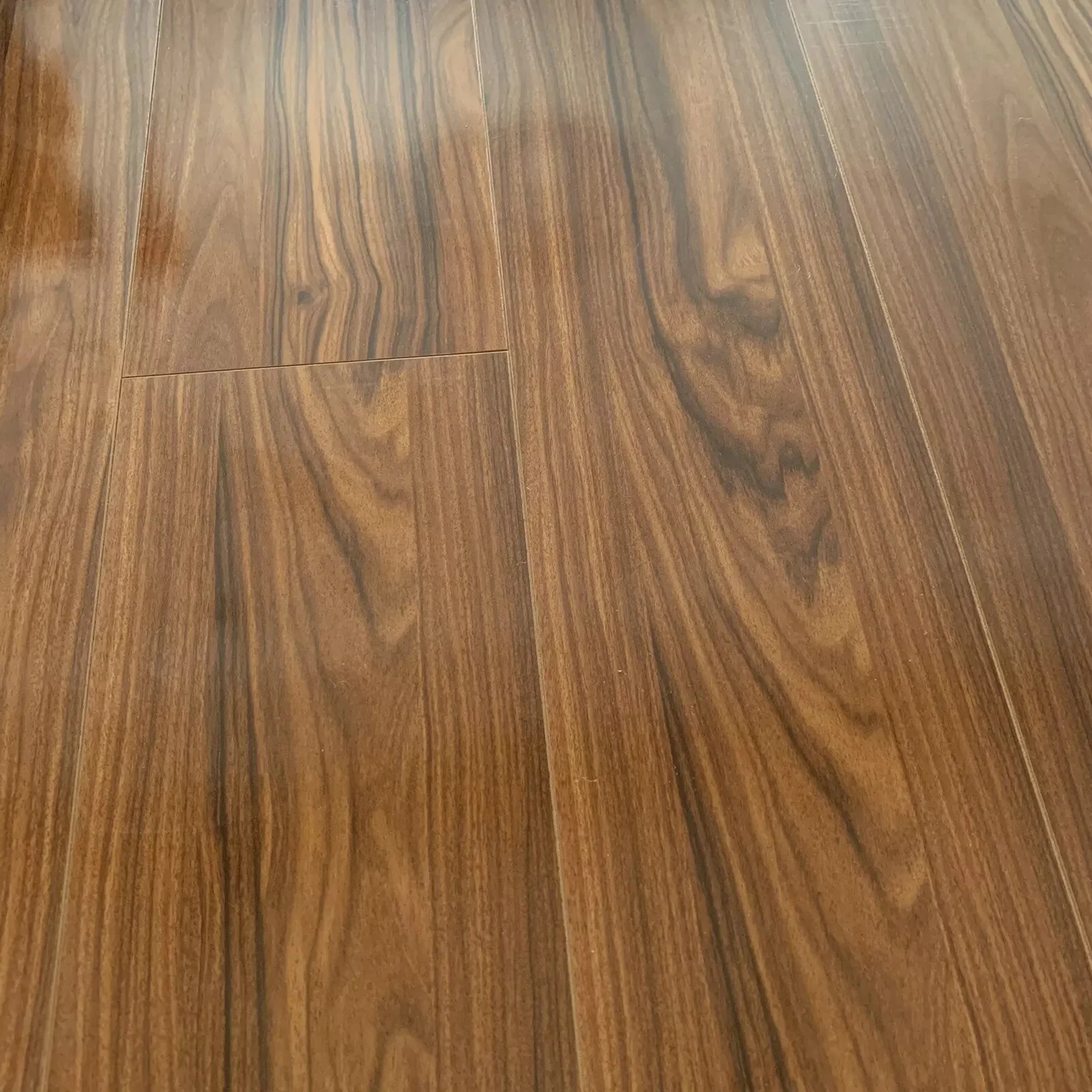 High Gloss Bourbon Laminate Flooring - Image 13