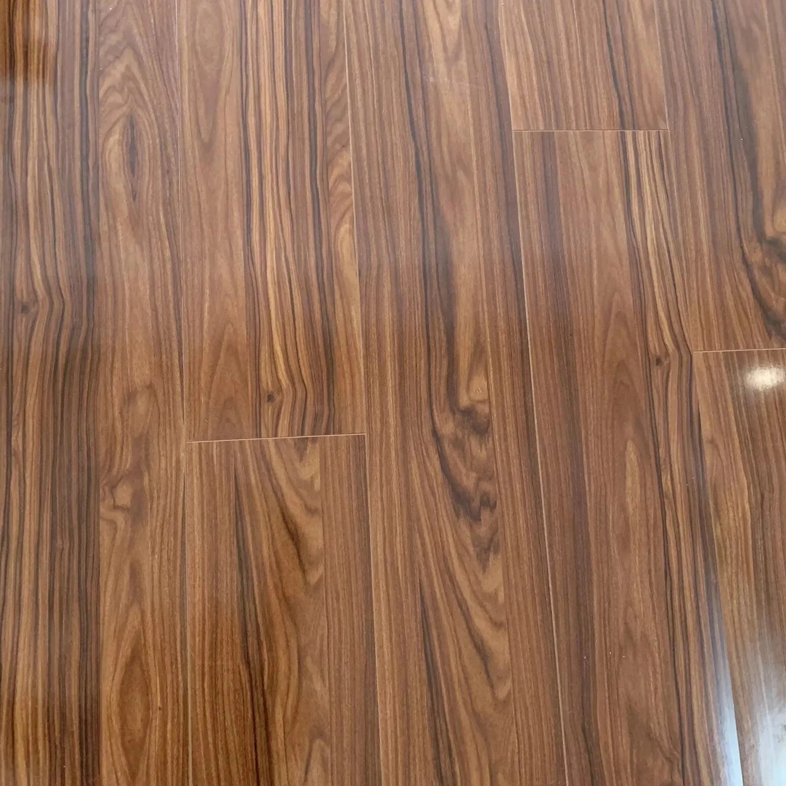High Gloss Bourbon Laminate Flooring - Image 3