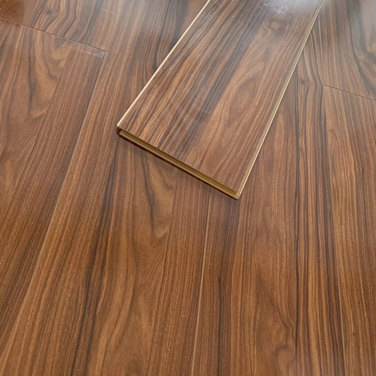High Gloss Bourbon Laminate Flooring - Image 6