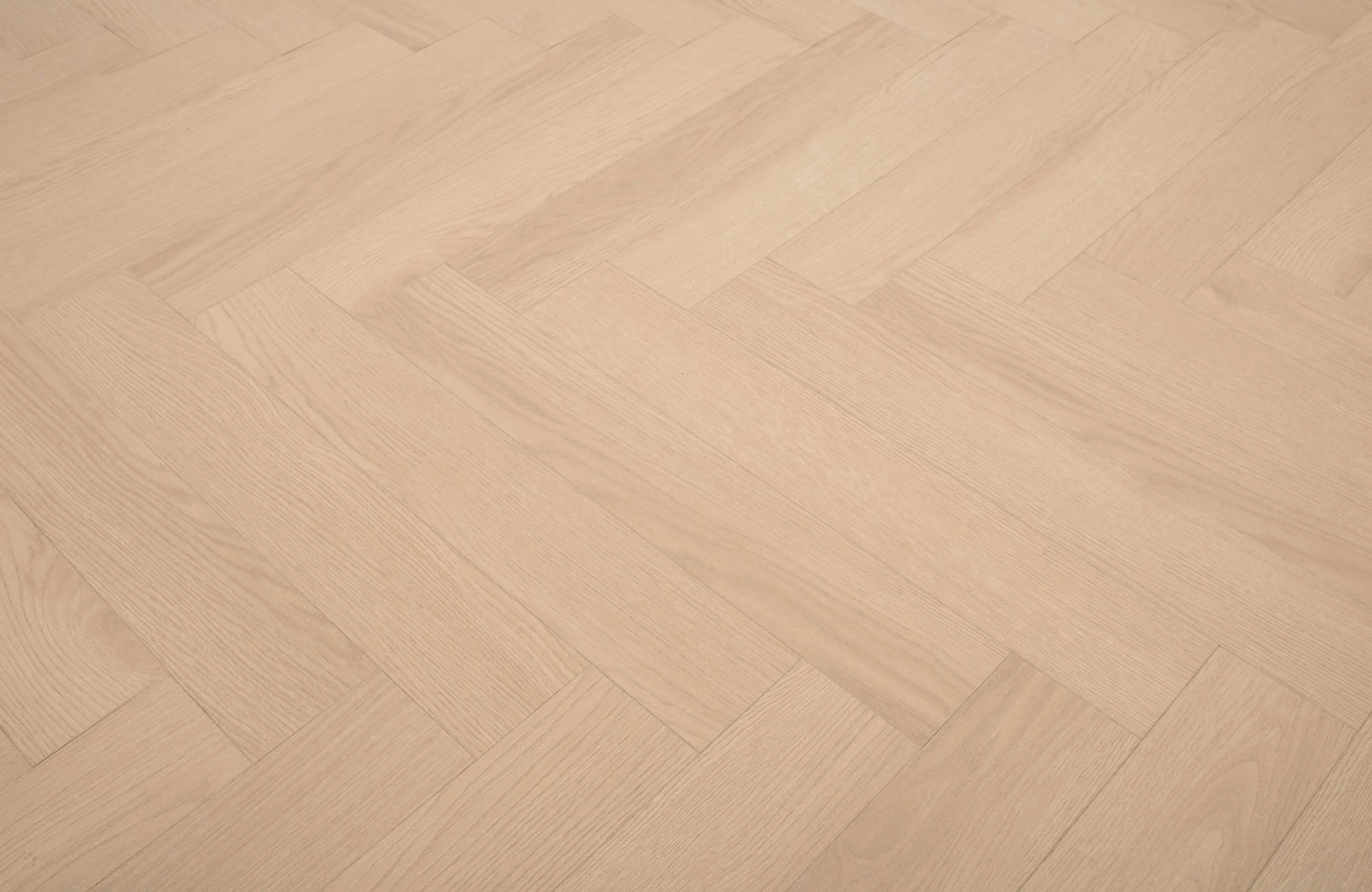 Light Oak 12mm Eversham Oak Herringbone Laminate Flooring - Image 8