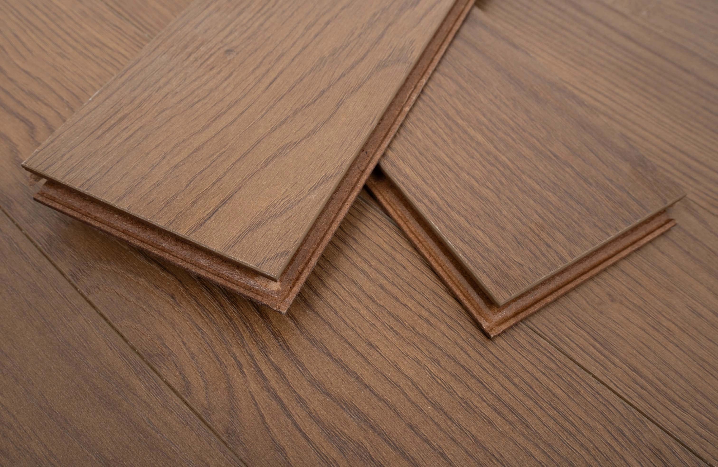 Dark Brown 12mm Westbury Oak Herringbone Laminate Flooring - Image 4